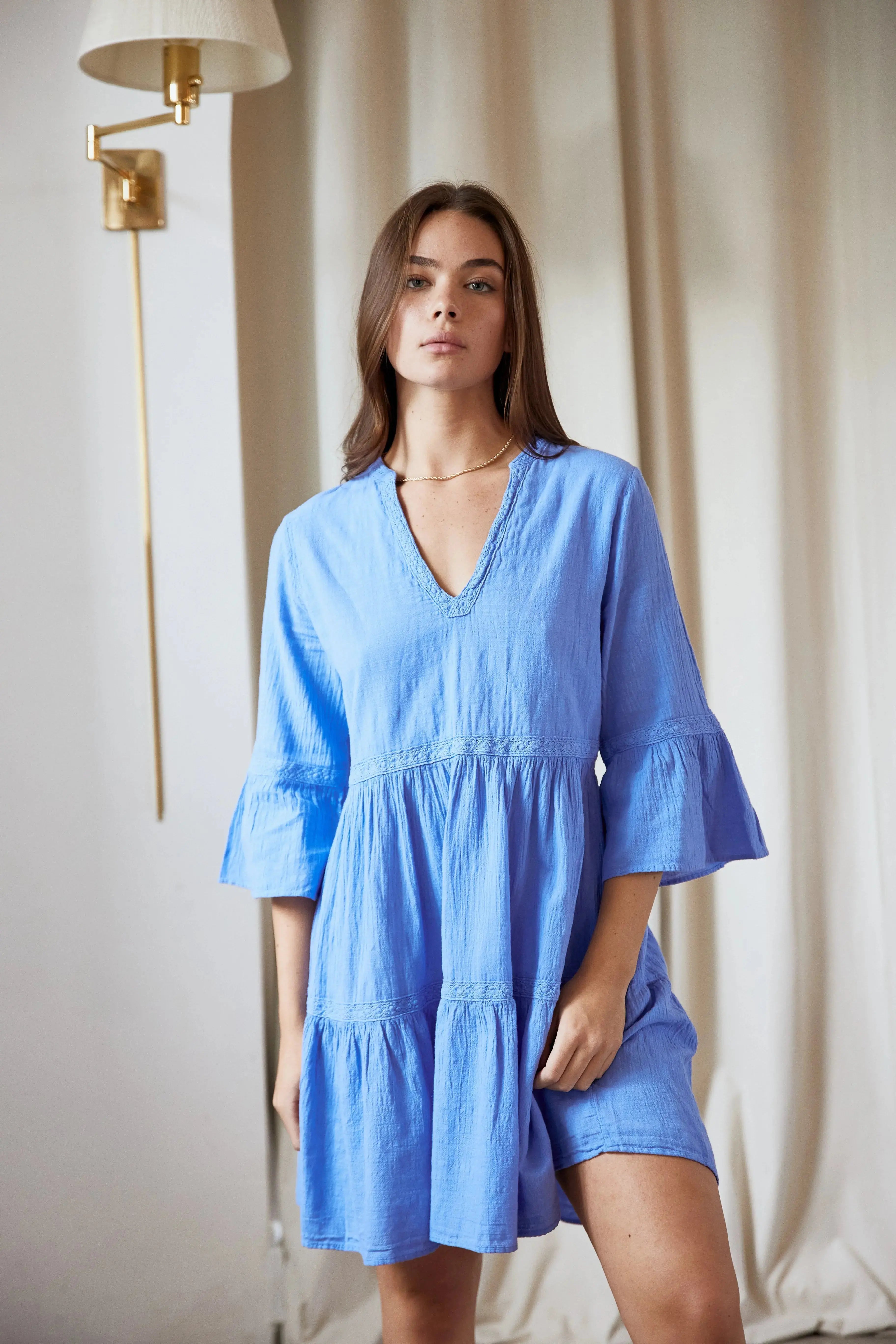 White Mini Dress with V-Neck & Ruched Detail